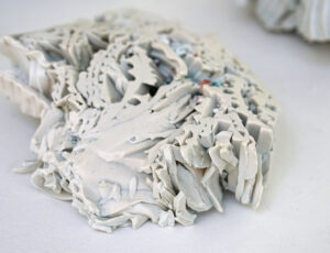 Jenny Beavan 'Plate movement 3' Porcelain glazes, beach sand & glass £150