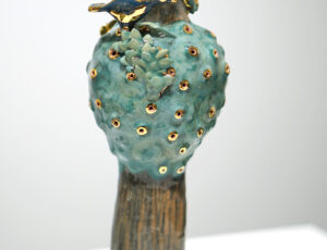 Katie Bunnell 'Tree Person with Bird Nest, 2023', ceramic sculpture: handbuilt terracotta, slip, gold lustre, 13 x 32 x 12cm, £350