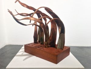 Robin Langford 'Turbulent Seas', salvaged shipwreck copper, verdigris & Iroko wooden base, 28 x 18 x 37 cm, £795