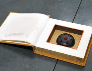 Andrew Lanyon ‘Hollow Book with Oil, painting - 'Intricately Wired'’, (1995), Wood, paper, material and card, 18 x 18.5cm, £1,000